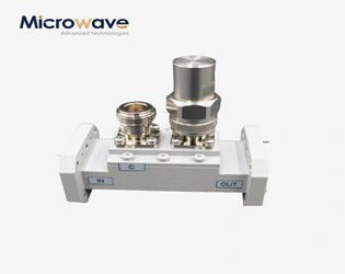 What are the fundamental differences between directional couplers and power dividers in waveguide systems?